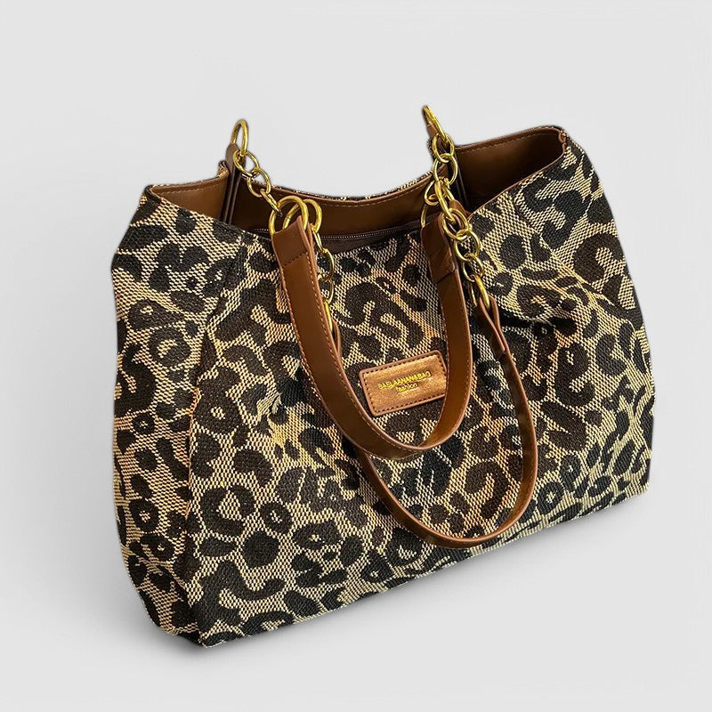 Claire™ – Leopardmönstrad toteväska